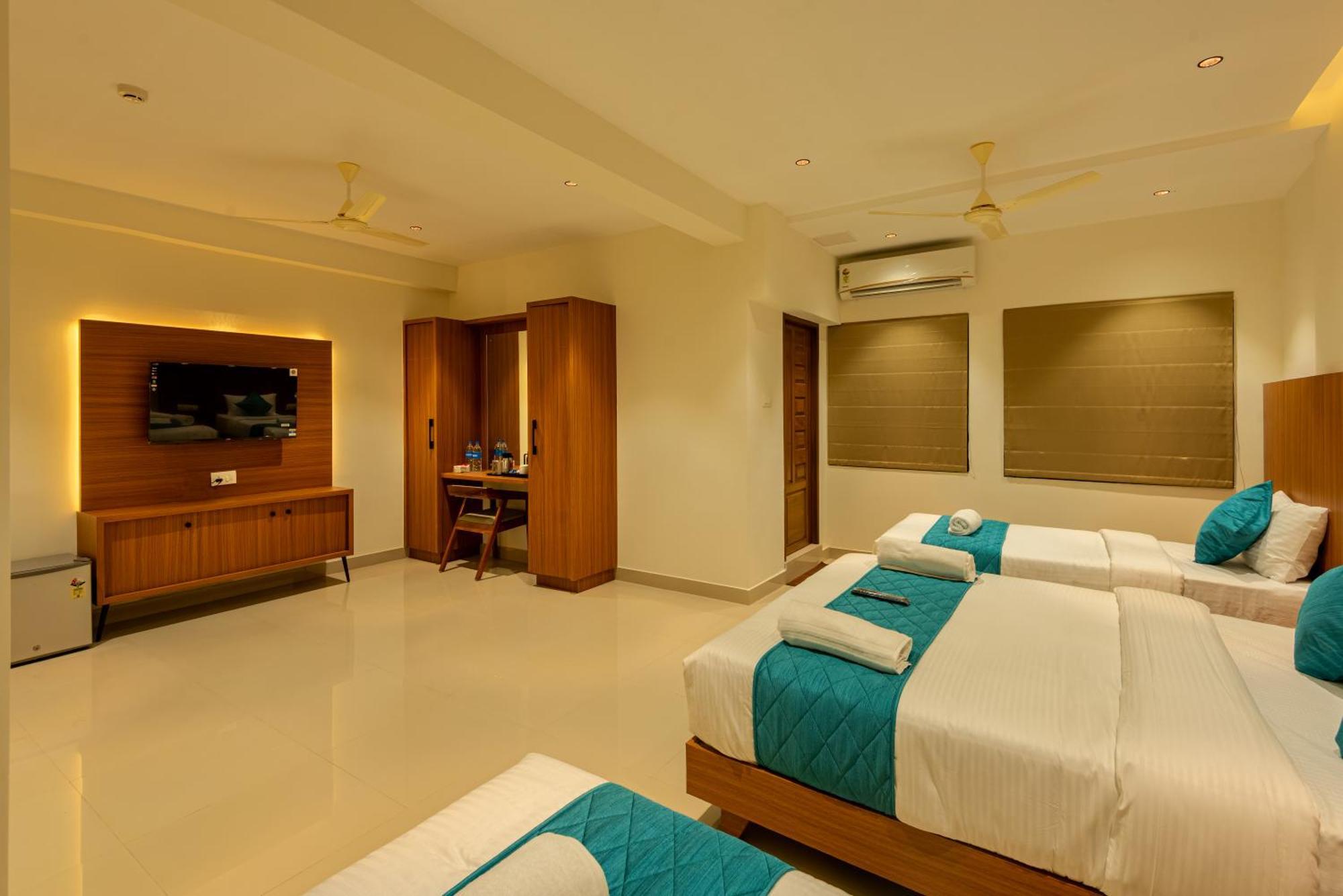 Hotel Stay Bella Кожикоде Экстерьер фото