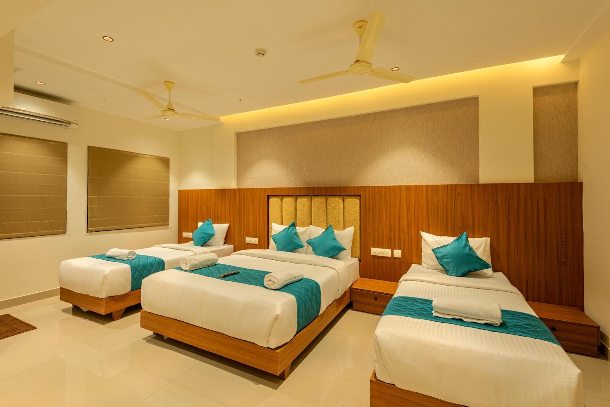 Hotel Stay Bella Кожикоде Экстерьер фото