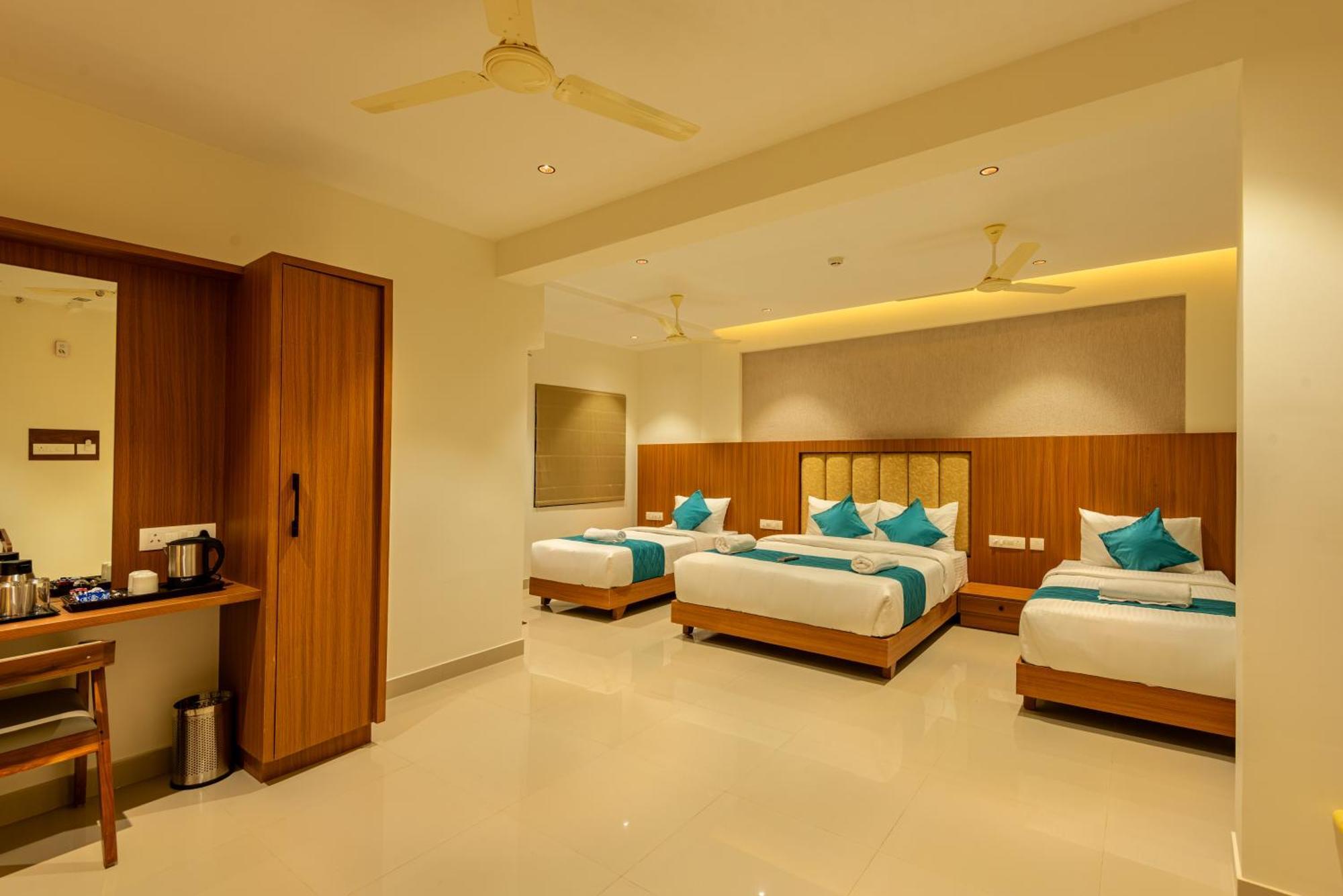 Hotel Stay Bella Кожикоде Экстерьер фото