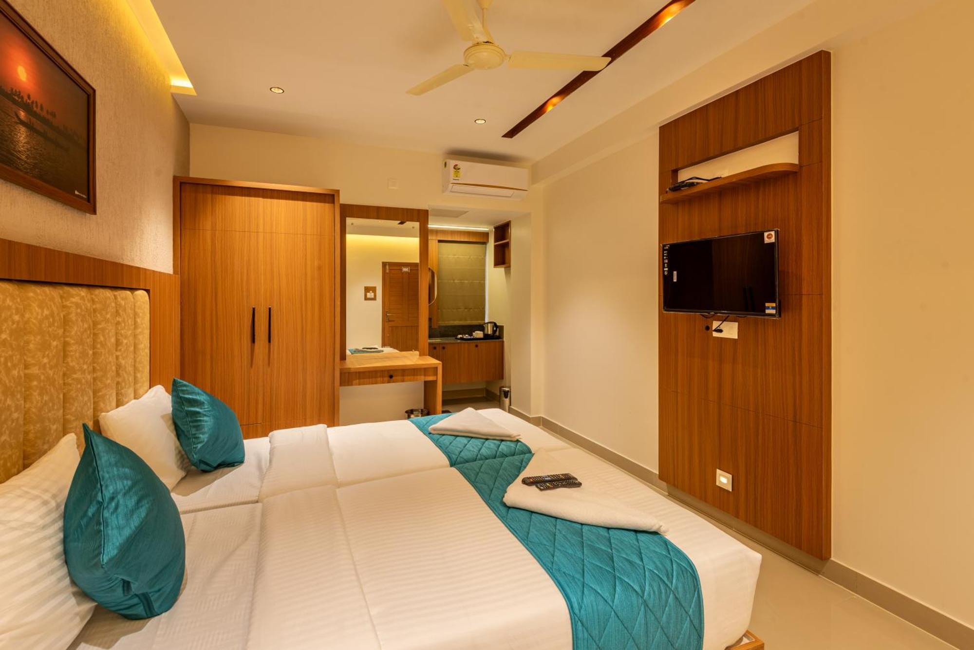 Hotel Stay Bella Кожикоде Экстерьер фото